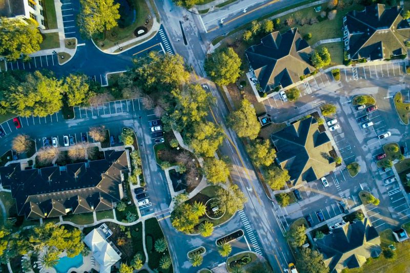 Aerial view of Lake Mary, FL, featuring residential streets surrounded by lush greenery.